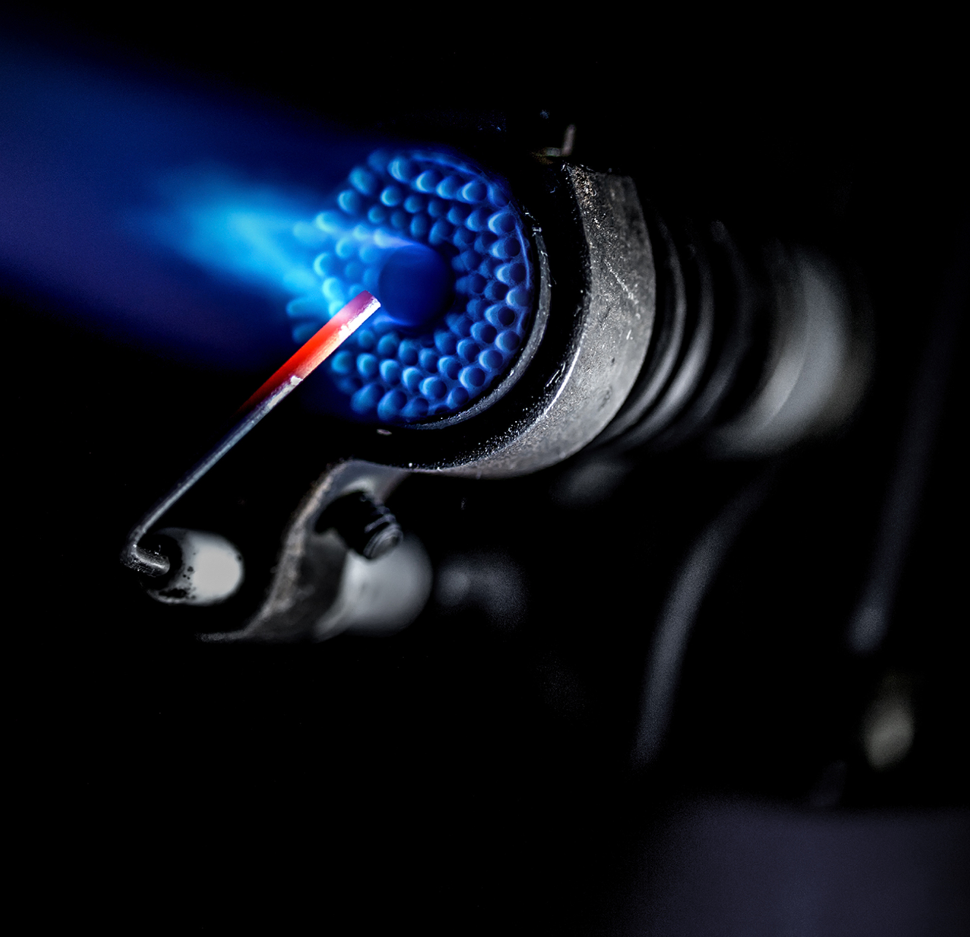 Blue torch flame representing the extreme heat CLOAK shields against